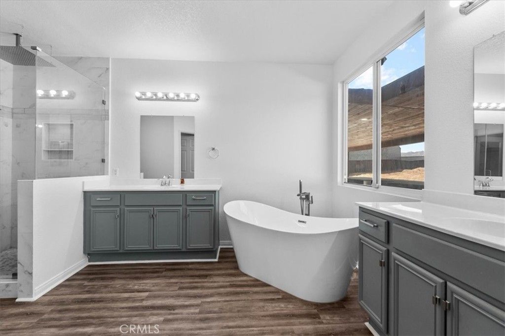 Bathroom, Dual Sink Vanities, Free Standing Baths, Glass Shower, Interior, Marble Walls, Wood Texture Flooring