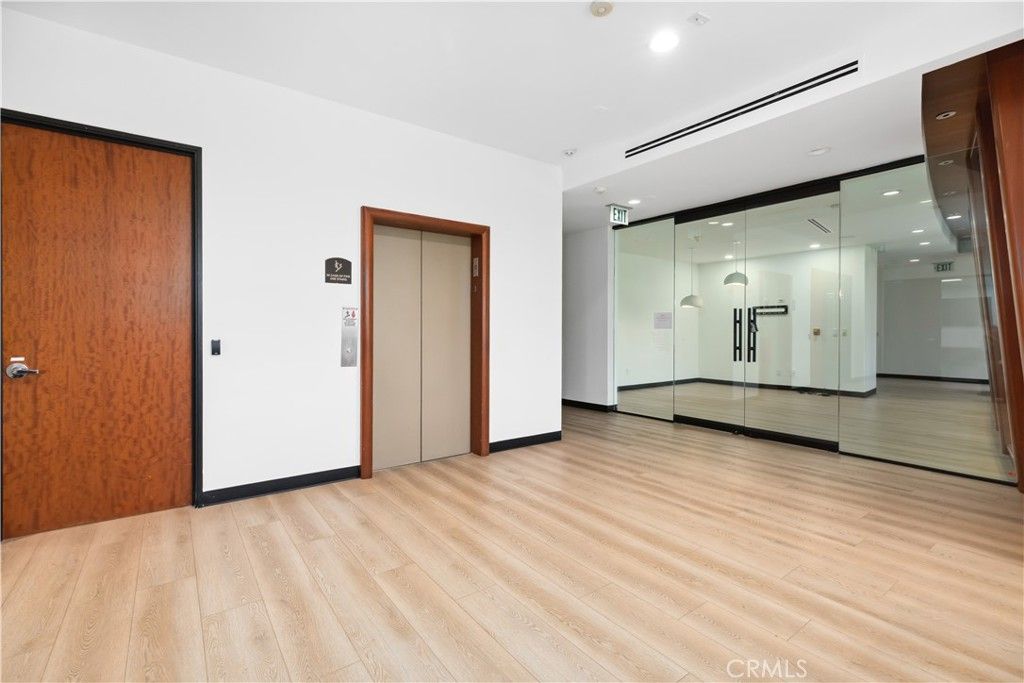 Elevator, Interior, Recessed Lighting, Wood Texture Flooring