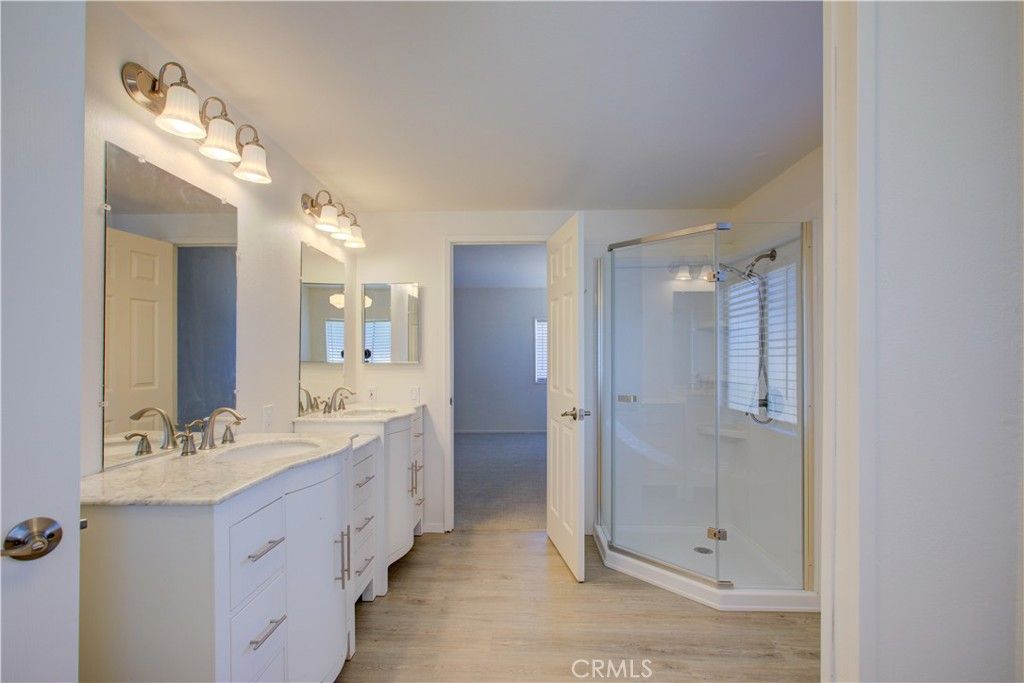 Bathroom, Dual Sink Vanities, Glass Shower, Interior, Wood Texture Flooring