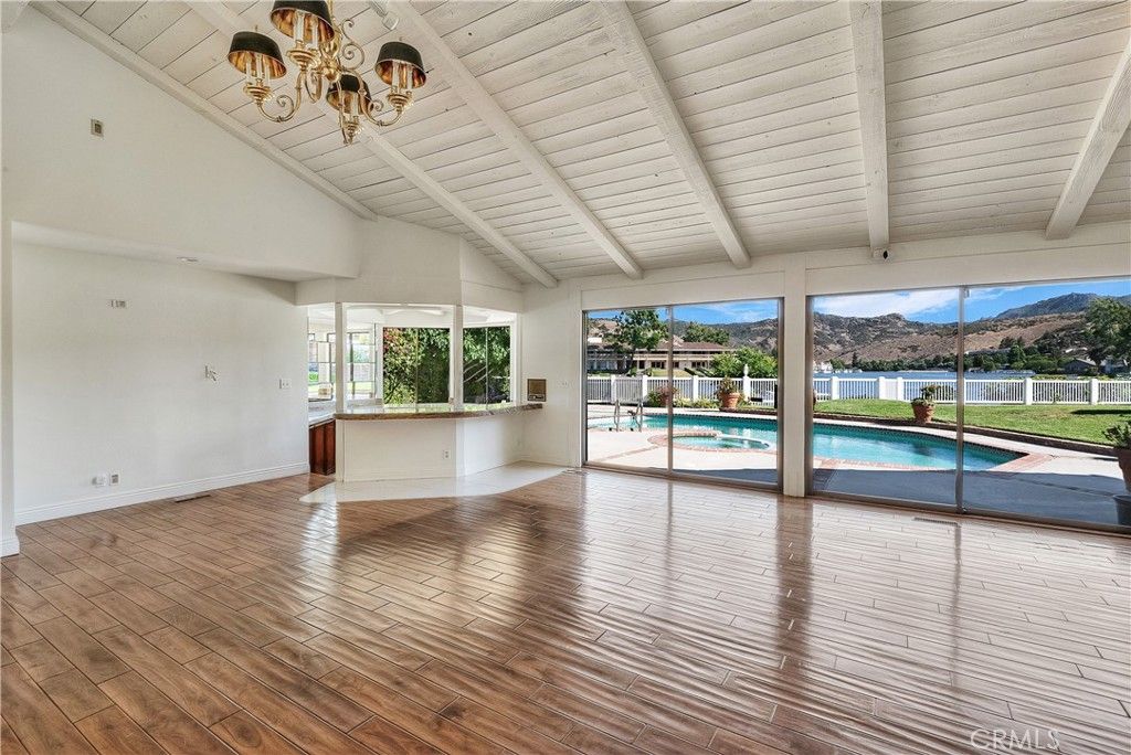 Chandelier, Empty room, Interior, Pool, Wood Texture Flooring