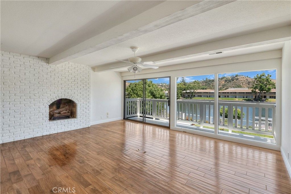 Empty room, Fireplace, Interior, Stone Walls, Water, Wood Texture Flooring