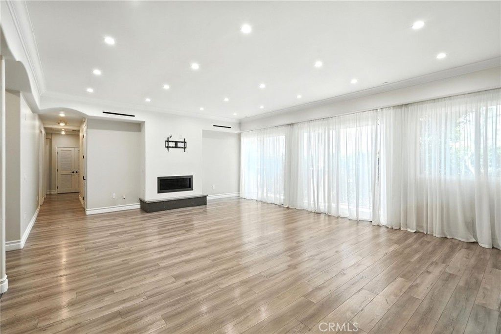 Empty room, Fireplace, Interior, Recessed Lighting, Wood Texture Flooring