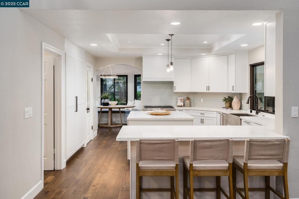 Interior, Kitchen, Pendant Lights, Recessed Lighting, Stainless Steel Appliances, Wood Texture Flooring