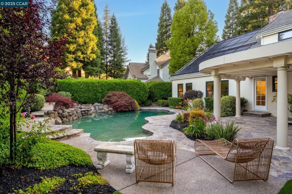 Exterior, Pool, Solar Panels