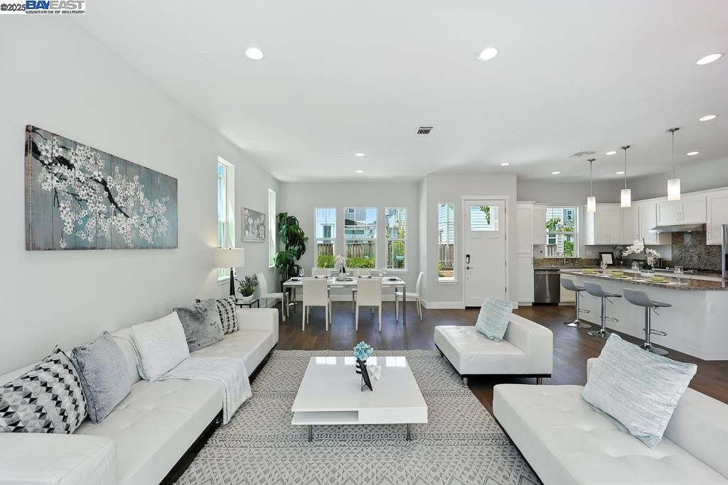 Dining room, Interior, Kitchen, Living room, Pendant Lights, Recessed Lighting, Stainless Steel Appliances, Wood Texture Flooring