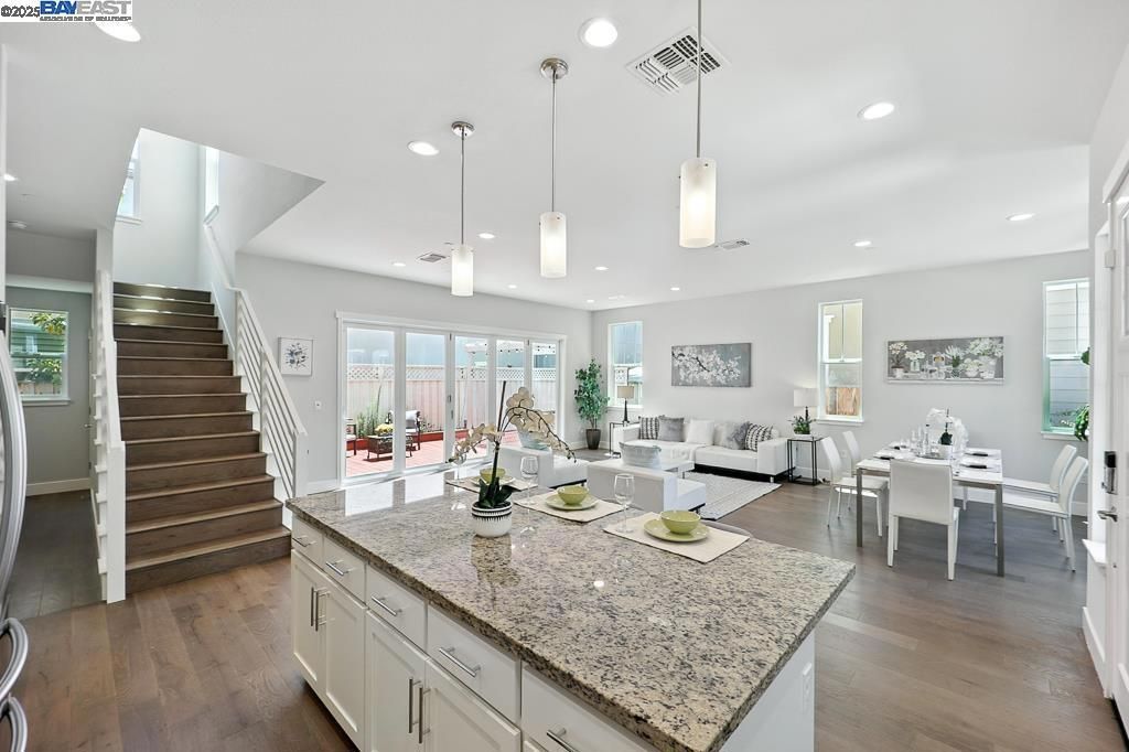 Dining room, Interior, Living room, Pendant Lights, Recessed Lighting, Wood Texture Flooring