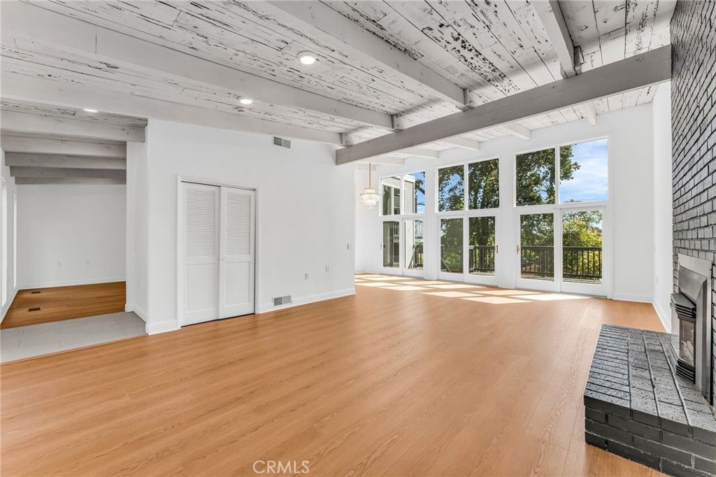 Empty room, Fireplace, Interior, Pendant Lights, Recessed Lighting, Wood Texture Flooring