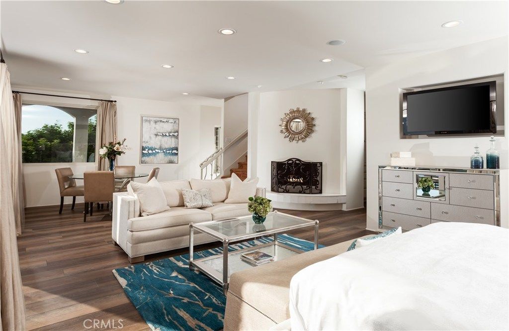 Dining room, Fireplace, Interior, Living room, Recessed Lighting, Wood Texture Flooring