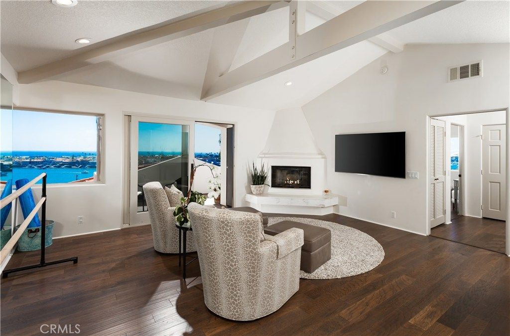 Fireplace, Interior, Living room, Recessed Lighting, Water, Wood Texture Flooring
