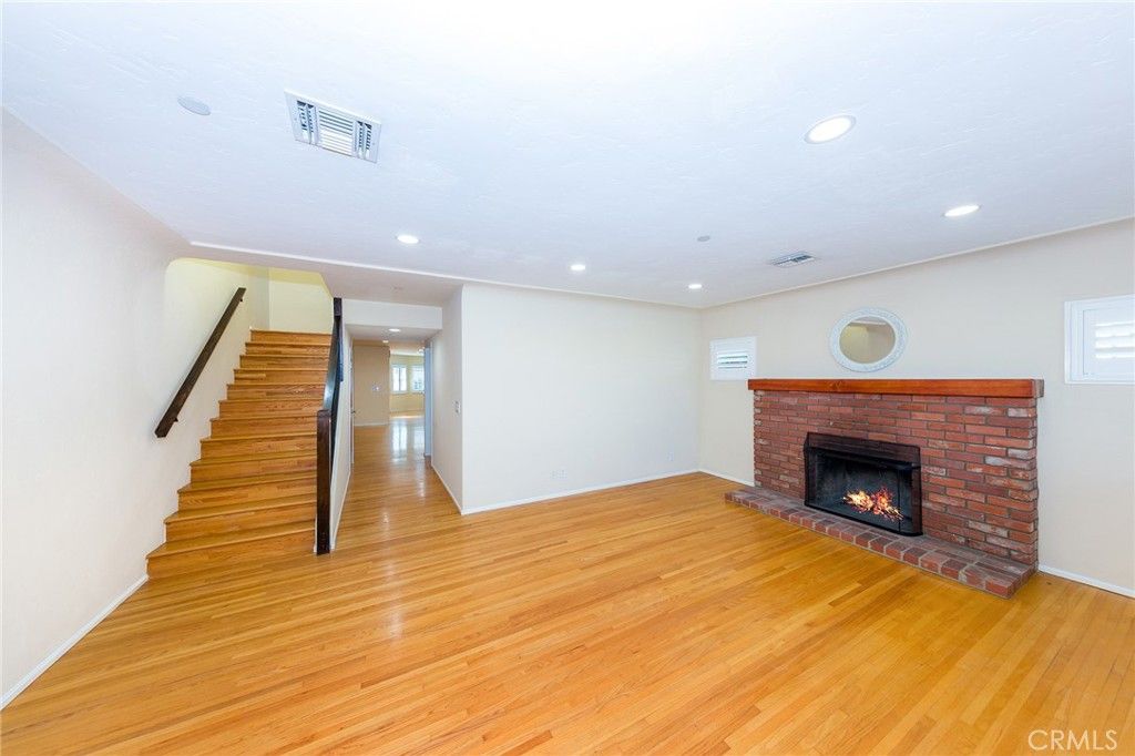 Empty room, Fireplace, Interior, Recessed Lighting, Wood Texture Flooring
