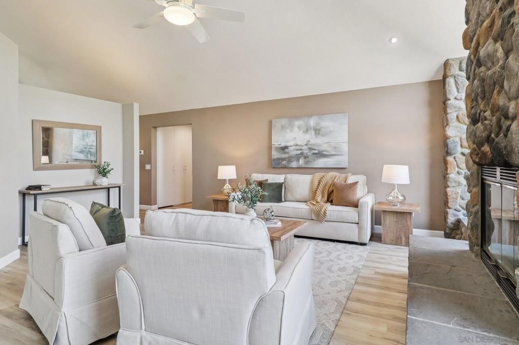Fireplace, Interior, Living room, Recessed Lighting, Stone Walls, Wood Texture Flooring