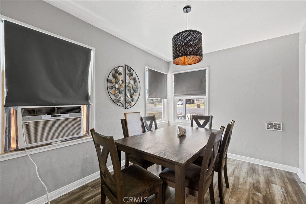 Dining room, Fireplace, Interior, Pendant Lights, Wood Texture Flooring