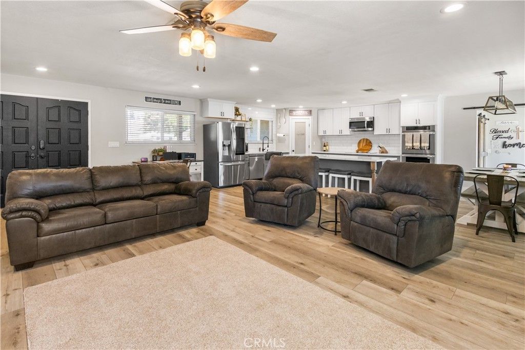 Dining room, Interior, Kitchen, Living room, Pendant Lights, Recessed Lighting, Stainless Steel Appliances, Wood Texture Flooring
