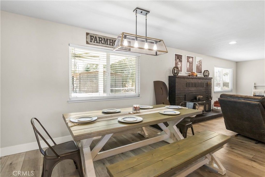 Dining room, Fireplace, Interior, Pendant Lights, Recessed Lighting, Wood Texture Flooring