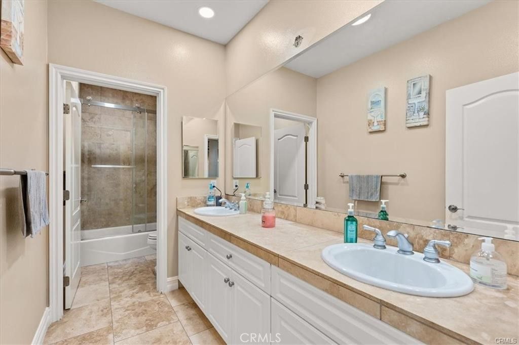 Bathroom, Dual Sink Vanities, Glass Shower, Interior, Recessed Lighting, Tile Countertops