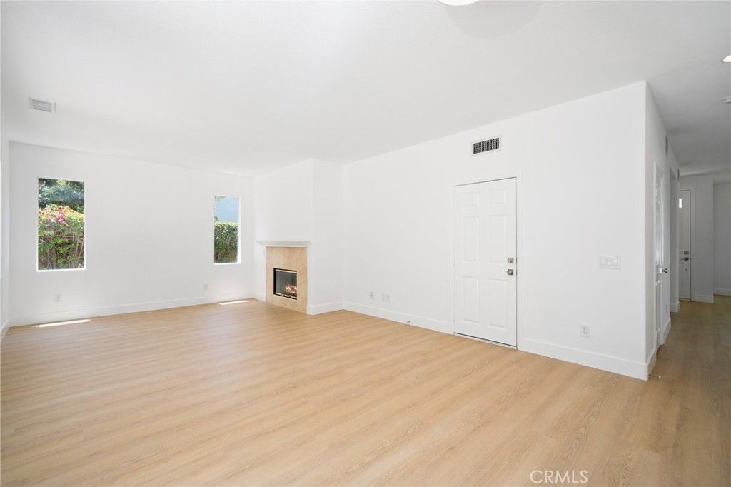 Empty room, Fireplace, Interior, Recessed Lighting, Wood Texture Flooring