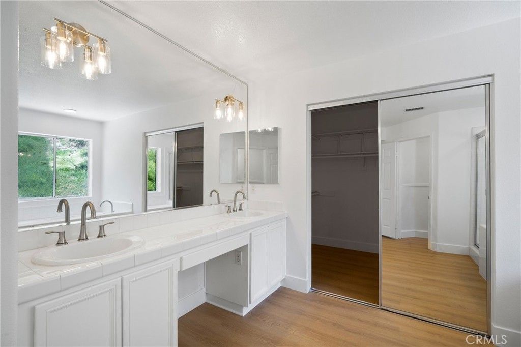 Bathroom, Dual Sink Vanities, Interior, Tile Countertops, Wood Texture Flooring