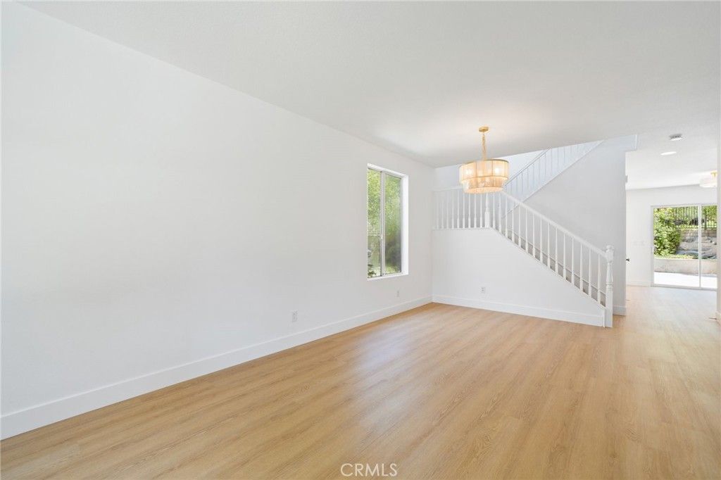 Chandelier, Empty room, Interior, Recessed Lighting, Wood Texture Flooring