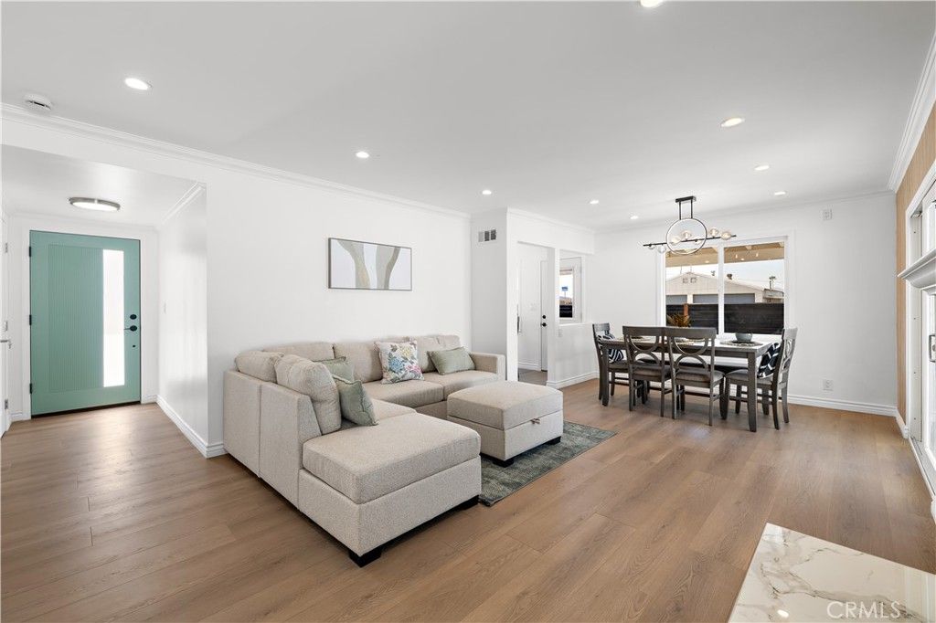 Dining room, Fireplace, Interior, Living room, Pendant Lights, Recessed Lighting, Wood Texture Flooring
