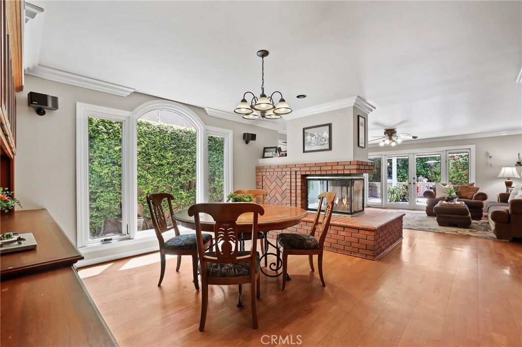 Chandelier, Dining room, Fireplace, Interior, Living room, Pendant Lights, Wood Texture Flooring