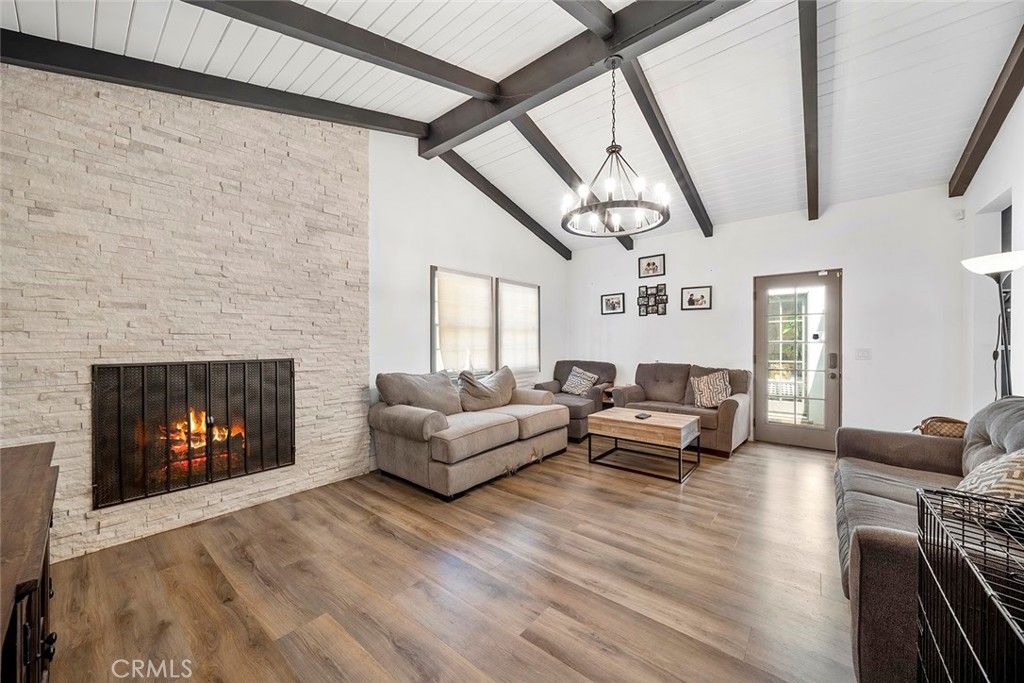 Fireplace, Interior, Living room, Pendant Lights, Stone Walls, Wooden Beams, Wood Texture Flooring