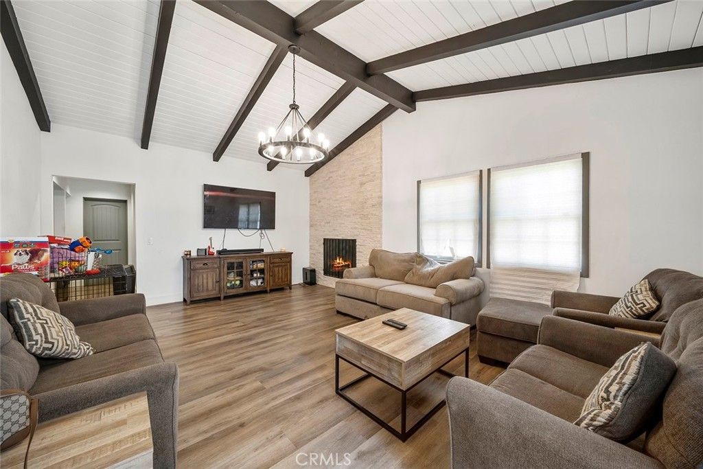 Fireplace, Interior, Living room, Pendant Lights, Stone Walls, Wooden Beams, Wood Texture Flooring