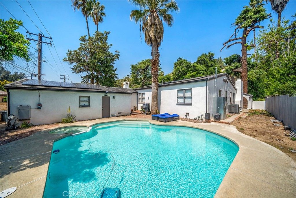 Exterior, Pool, Solar Panels