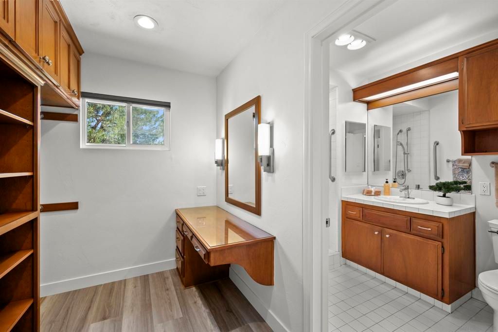 Bathroom, Dual Sink Vanities, Interior, Recessed Lighting, Wood Texture Flooring