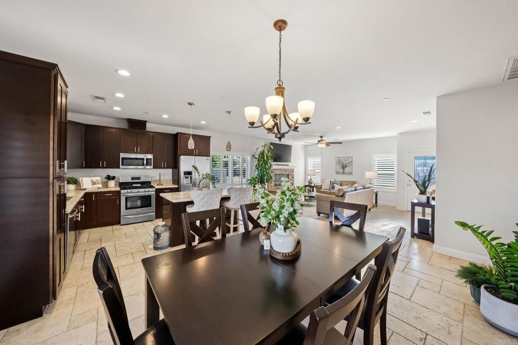 Chandelier, Dining room, Interior, Kitchen, Living room, Pendant Lights, Recessed Lighting, Stainless Steel Appliances