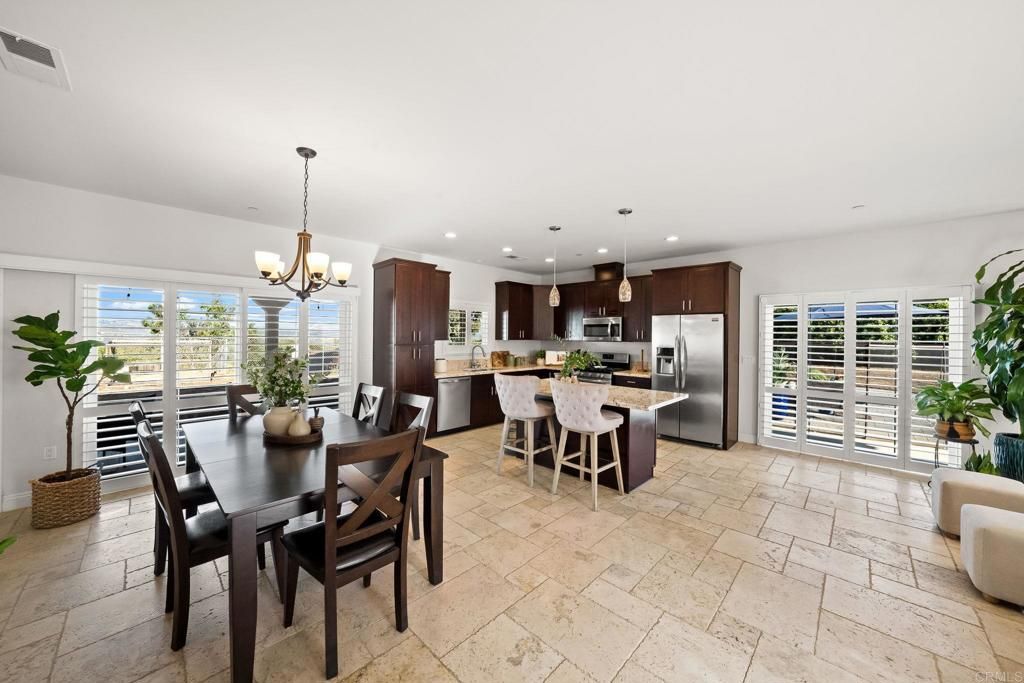 Chandelier, Dining room, Interior, Kitchen, Pendant Lights, Recessed Lighting, Stainless Steel Appliances