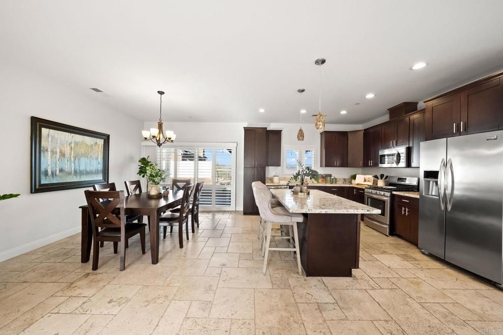 Chandelier, Dining room, Interior, Kitchen, Pendant Lights, Recessed Lighting, Stainless Steel Appliances