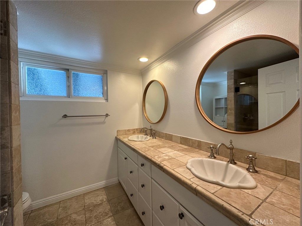 Bathroom, Dual Sink Vanities, Interior, Recessed Lighting, Tile Countertops
