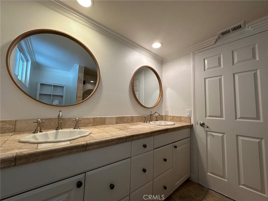 Bathroom, Dual Sink Vanities, Interior, Recessed Lighting, Tile Countertops