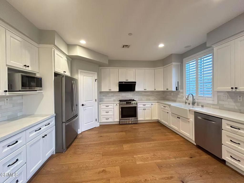 Interior, Kitchen, Recessed Lighting, Stainless Steel Appliances, Wood Texture Flooring