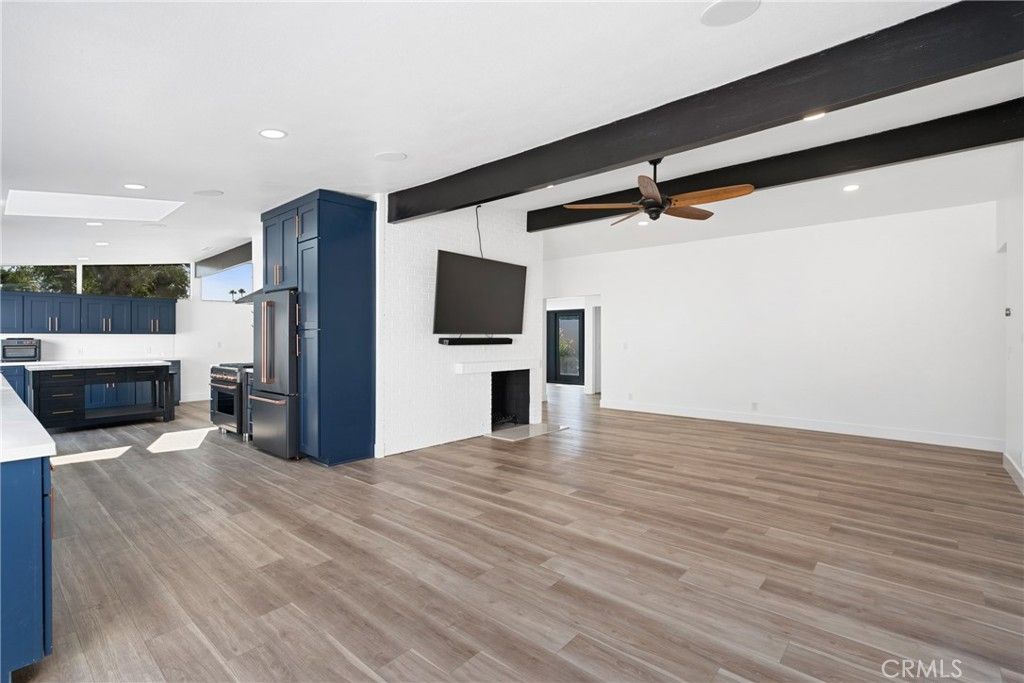 Empty room, Fireplace, Interior, Kitchen, Recessed Lighting, Wood Texture Flooring
