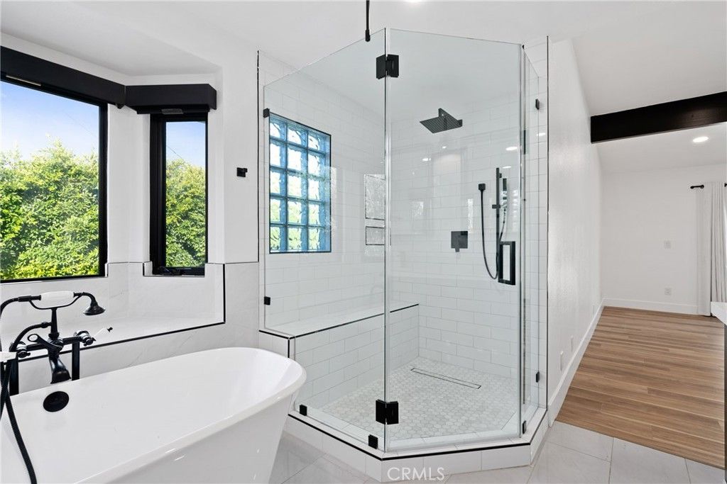 Bathroom, Free Standing Baths, Glass Shower, Interior, Recessed Lighting, Wood Texture Flooring