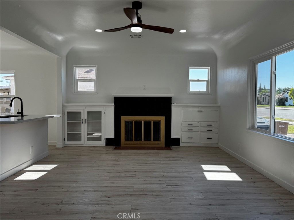 Fireplace, Interior, Recessed Lighting, Wood Texture Flooring