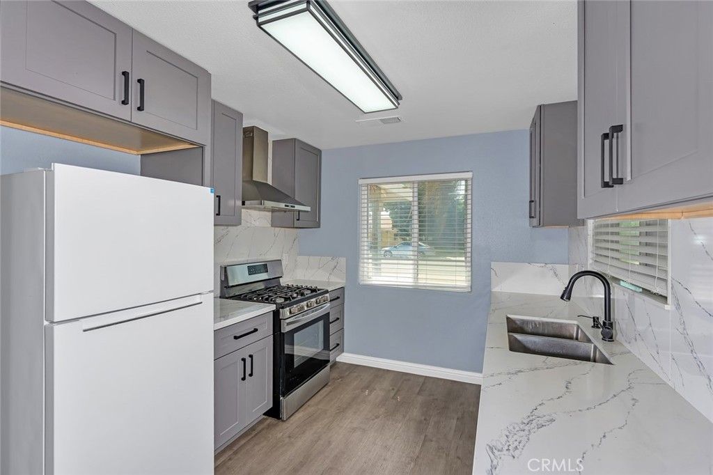 Interior, Kitchen, Marble Walls, Stainless Steel Appliances, Wood Texture Flooring