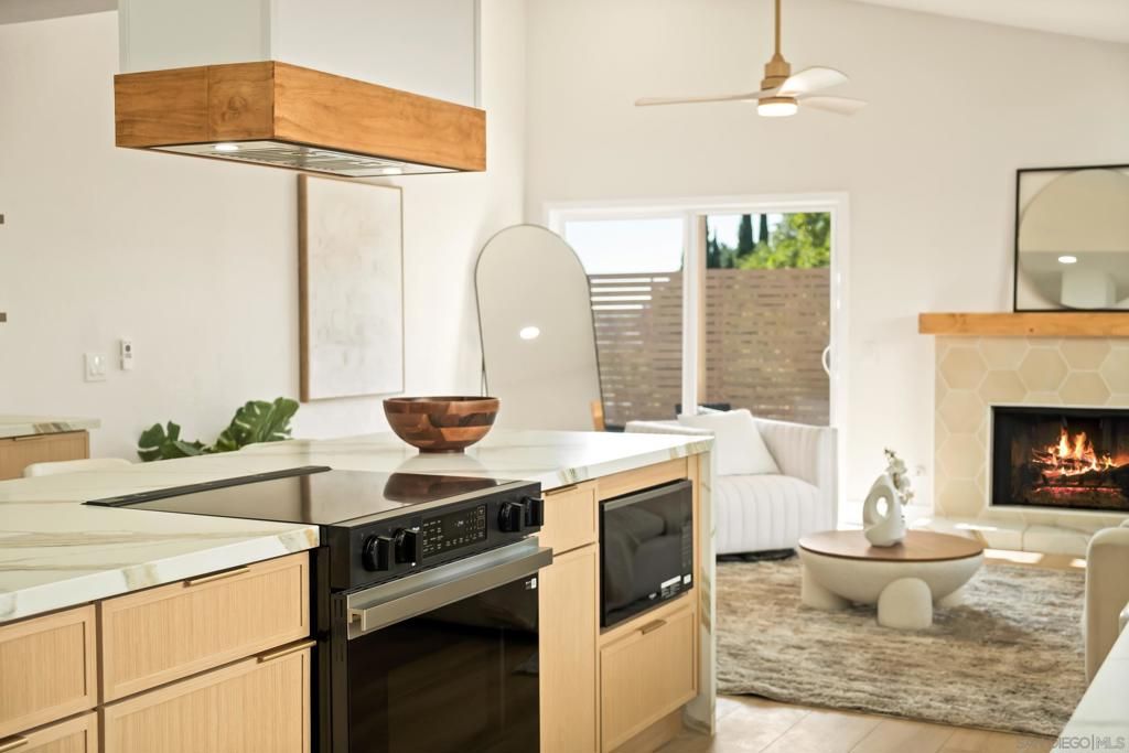 Fireplace, Interior, Kitchen, Living room, Stainless Steel Appliances, Wood Texture Flooring
