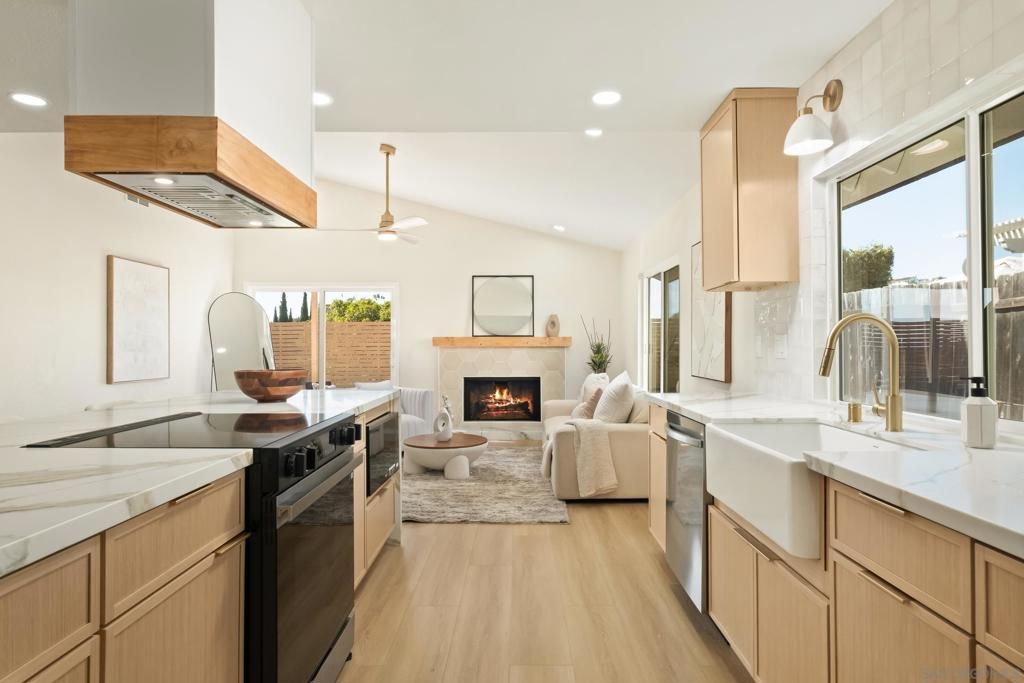 Fireplace, Interior, Kitchen, Living room, Recessed Lighting, Stainless Steel Appliances, Wood Texture Flooring