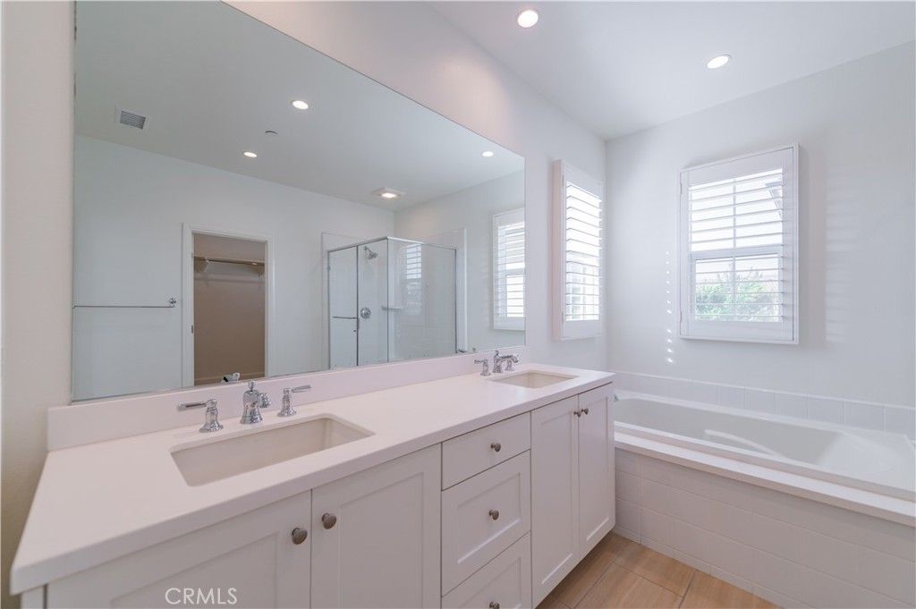 Bathroom, Dual Sink Vanities, Glass Shower, Interior, Recessed Lighting, Wood Texture Flooring