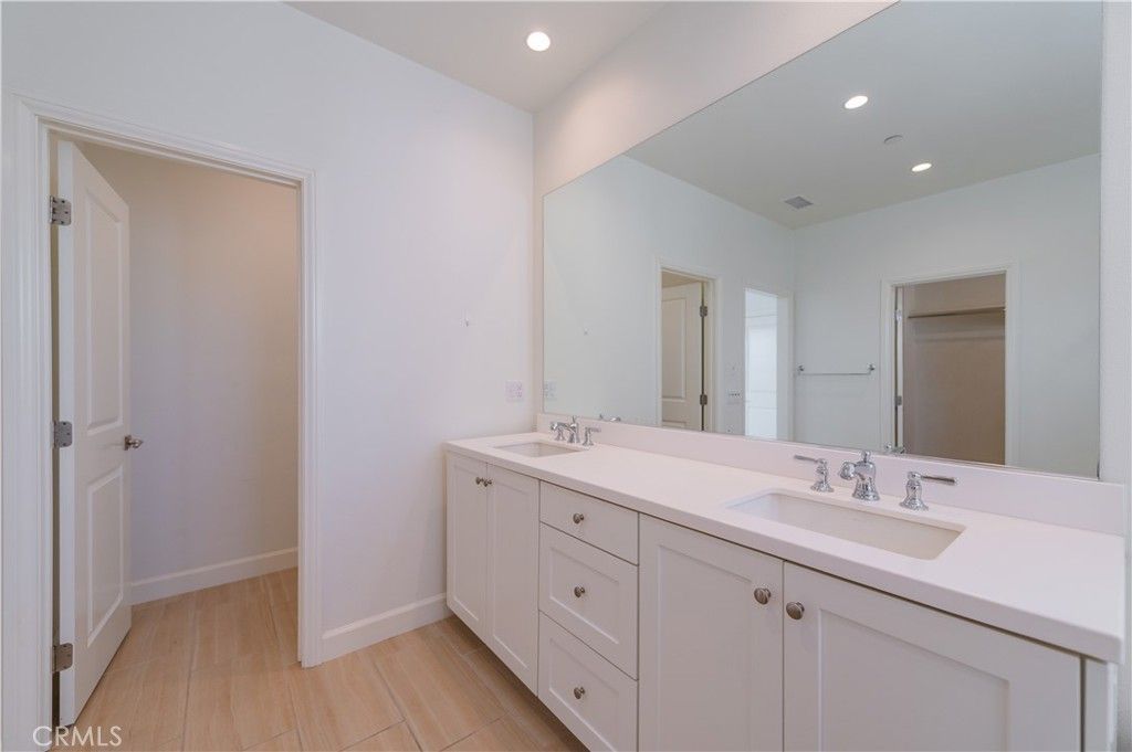 Bathroom, Dual Sink Vanities, Interior, Recessed Lighting, Wood Texture Flooring