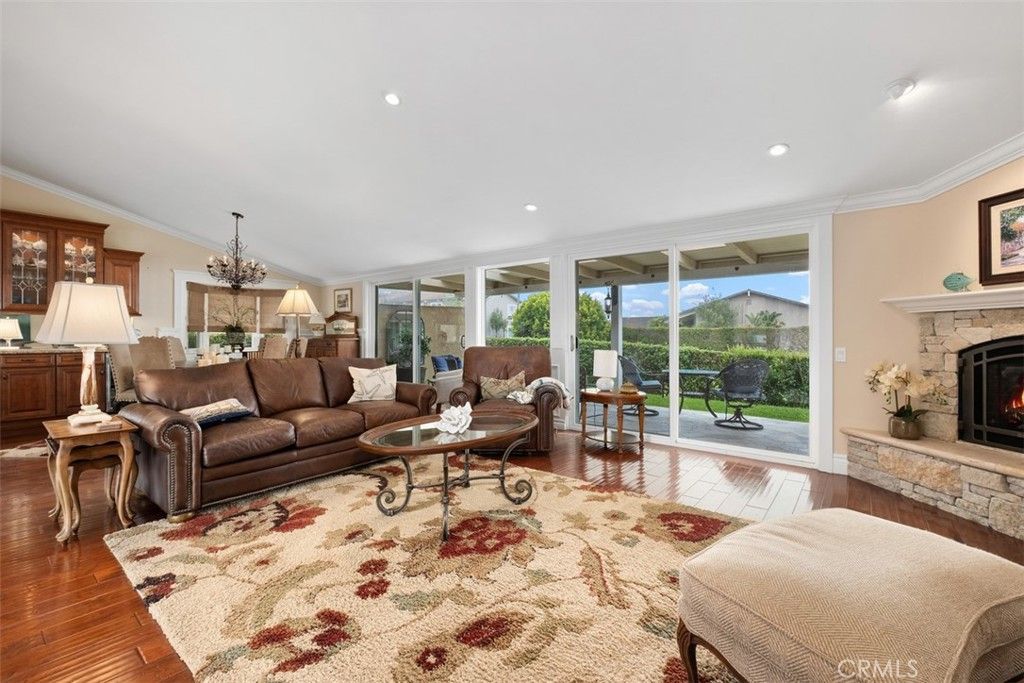 Chandelier, Fireplace, Interior, Living room, Recessed Lighting, Wood Texture Flooring