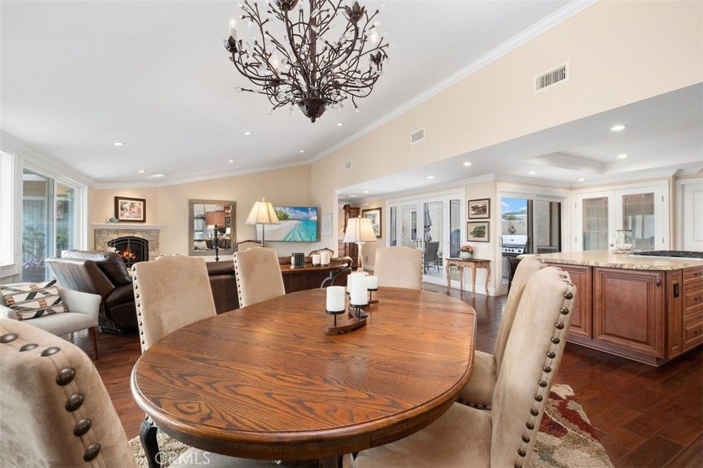 Chandelier, Dining room, Fireplace, Interior, Living room, Recessed Lighting, Wood Texture Flooring