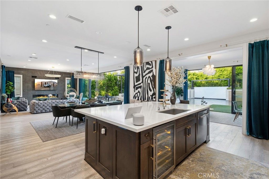 Chandelier, Dining room, Fireplace, Interior, Kitchen, Living room, Pendant Lights, Recessed Lighting, Wood Texture Flooring
