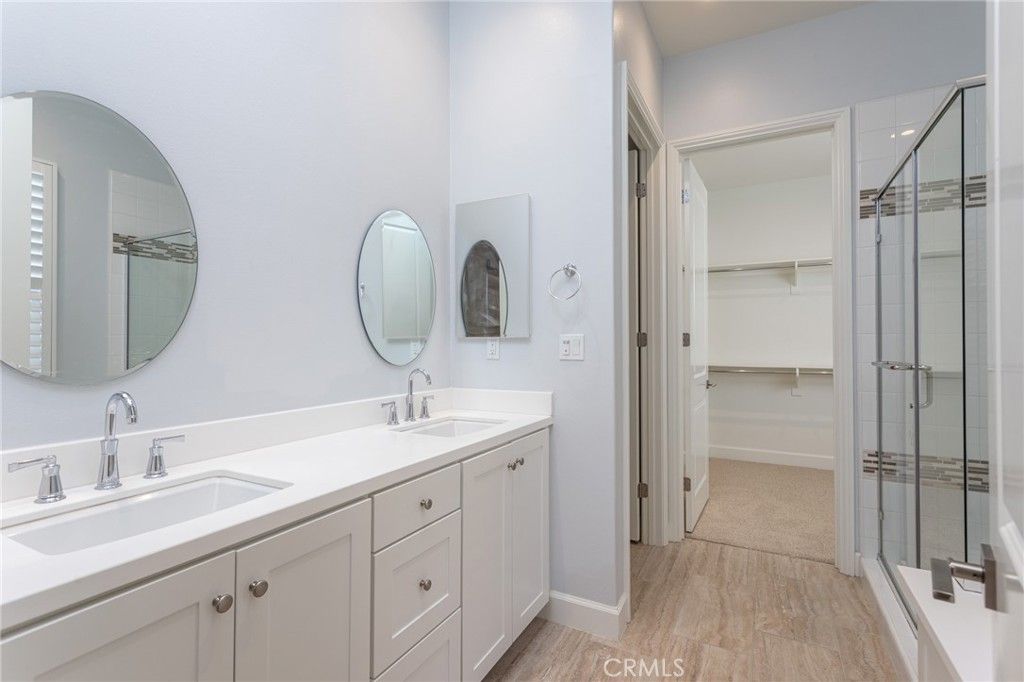 Bathroom, Dual Sink Vanities, Glass Shower, Interior, Walk-in Closets, Wood Texture Flooring