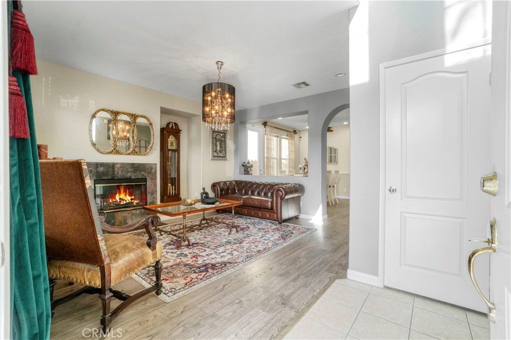 Chandelier, Fireplace, Interior, Living room, Recessed Lighting, Wood Texture Flooring