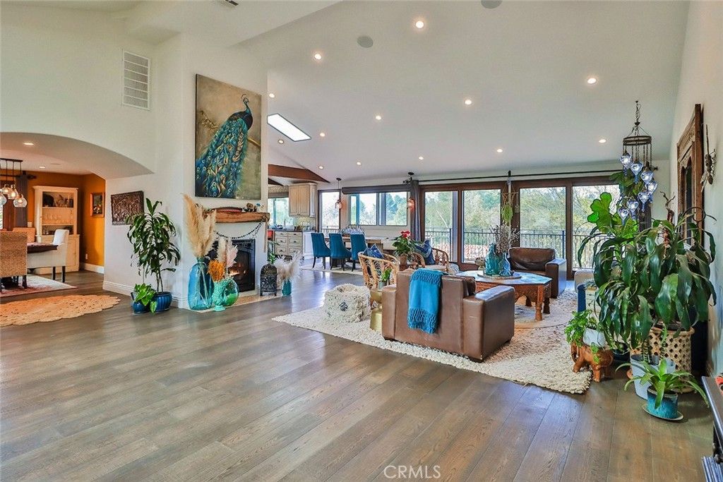 Dining room, Fireplace, Interior, Living room, Pendant Lights, Recessed Lighting, Wood Texture Flooring