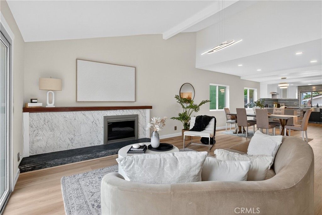 Dining room, Fireplace, Interior, Living room, Pendant Lights, Recessed Lighting, Wood Texture Flooring
