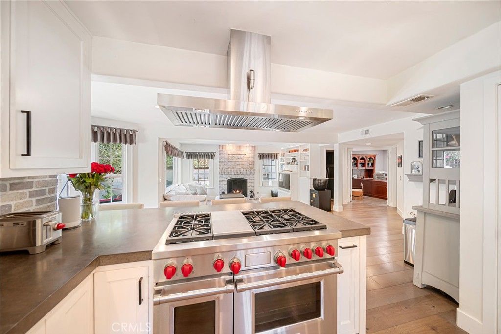 Fireplace, Interior, Kitchen, Stainless Steel Appliances, Wood Texture Flooring